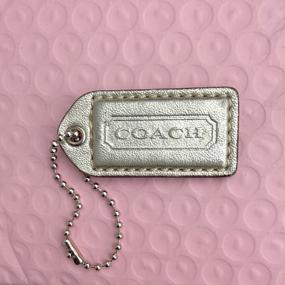 Coach Shimmering Silver Tag Keychain Coach Hangtag Coach bag accessories